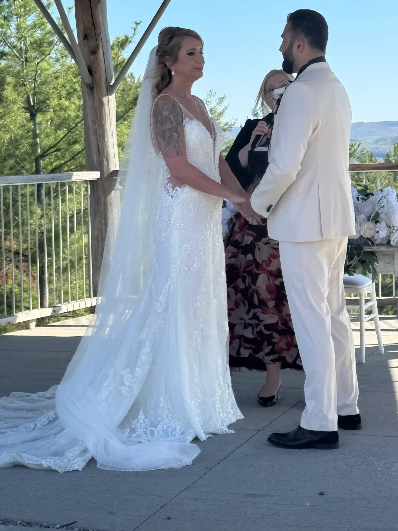 Outdoor ceremony with couple exchanging vows in the mountains